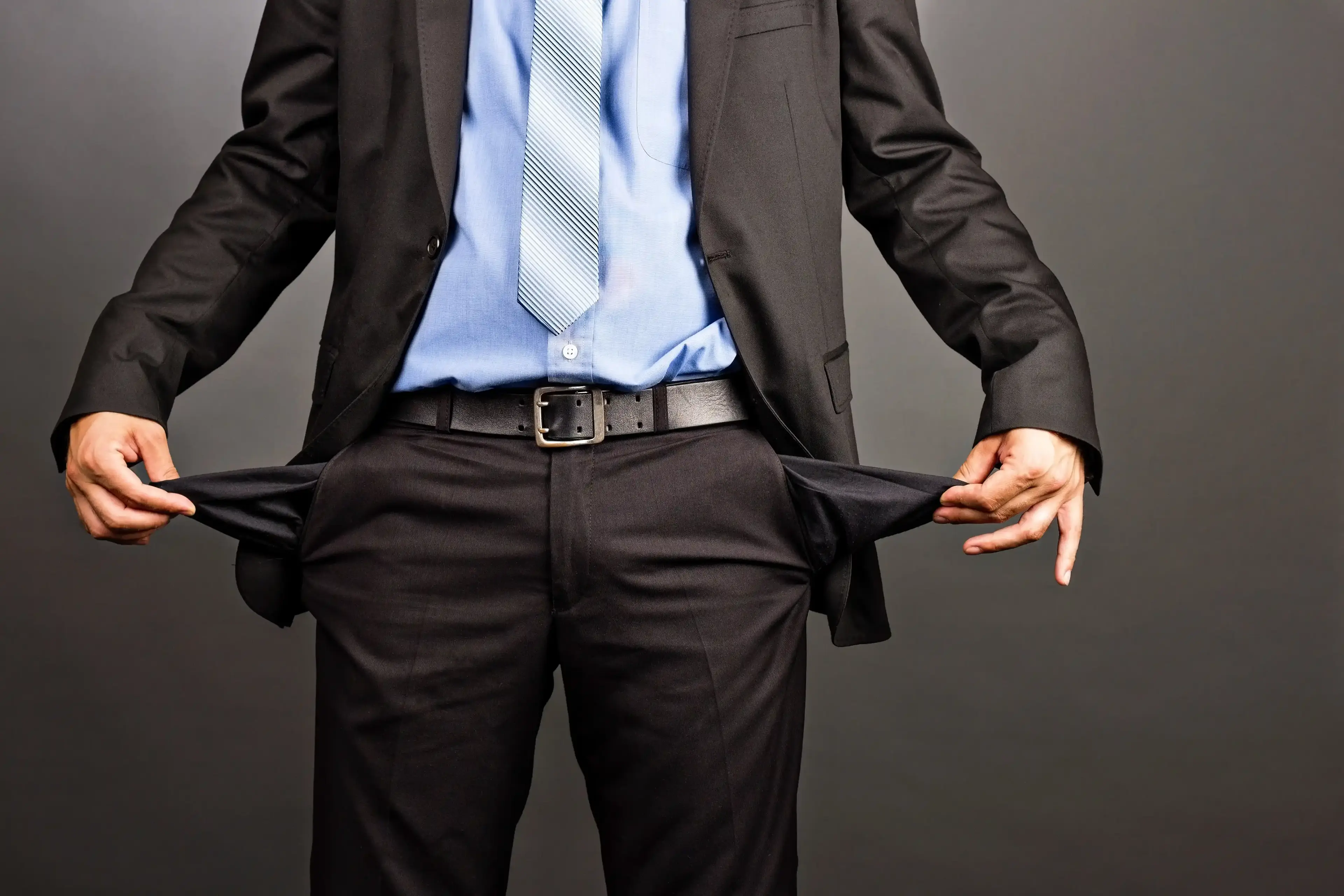 Business person reviewing financial documents showing missed opportunities